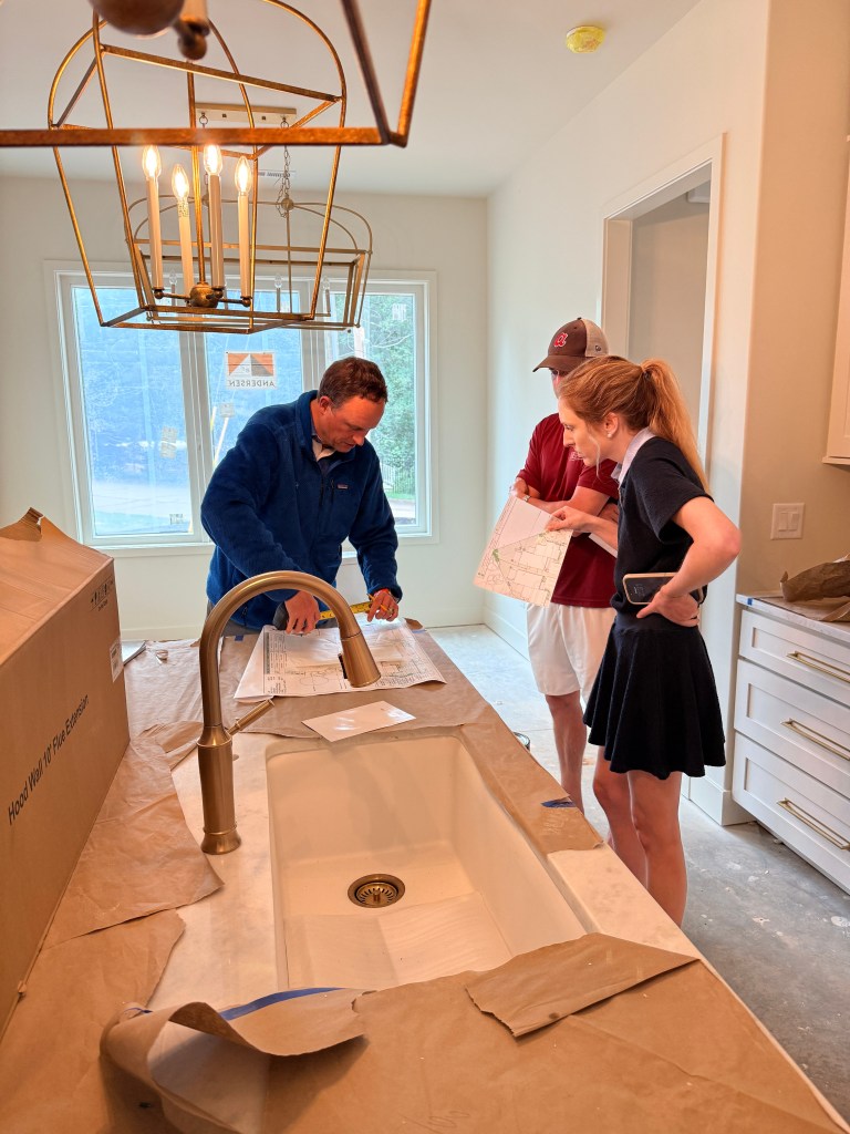 Ryan With Clients Revolution Homes